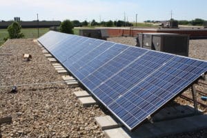 ballasted roof mounted solar panels on business